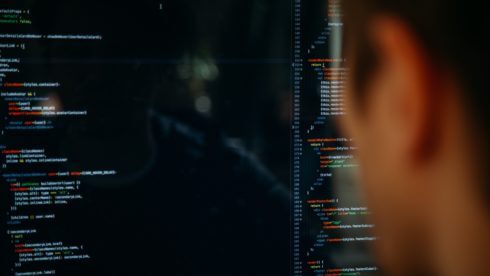 Man looking at computer screen GDPR swindells east sussex tax