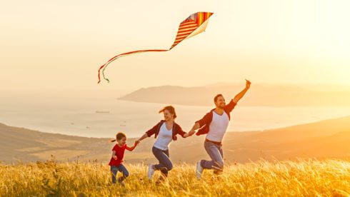 Happy Family with kite Swindells Accounting